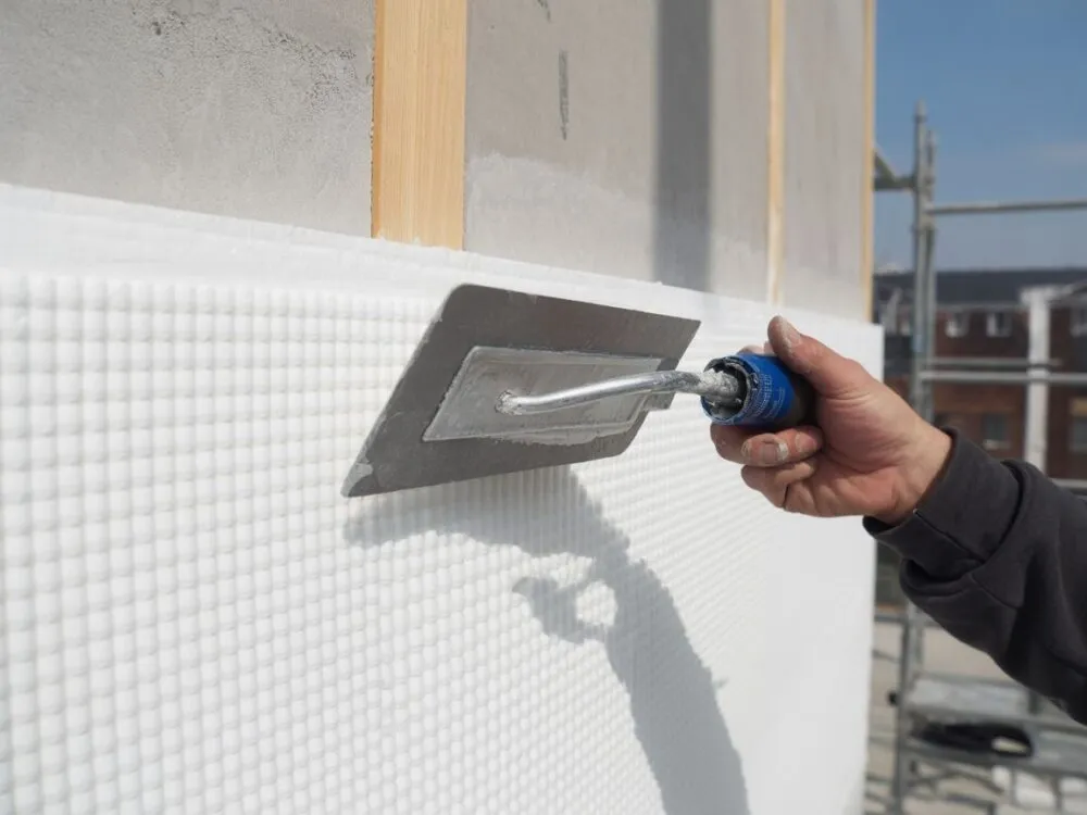 Jaki grunt pod klej do styropianu? Wybierz mądrze i trwale!