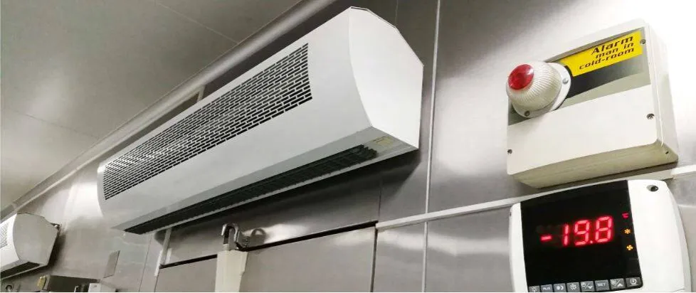 Kurtyna powietrzna czy grzejnik: co wybrać, aby zaoszczędzić na ogrzewaniu?