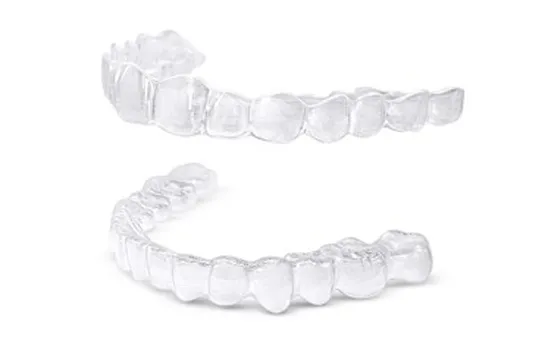 Ile kosztuje nakładka na zęby po aparacie? Sprawdź ceny i ukryte koszty