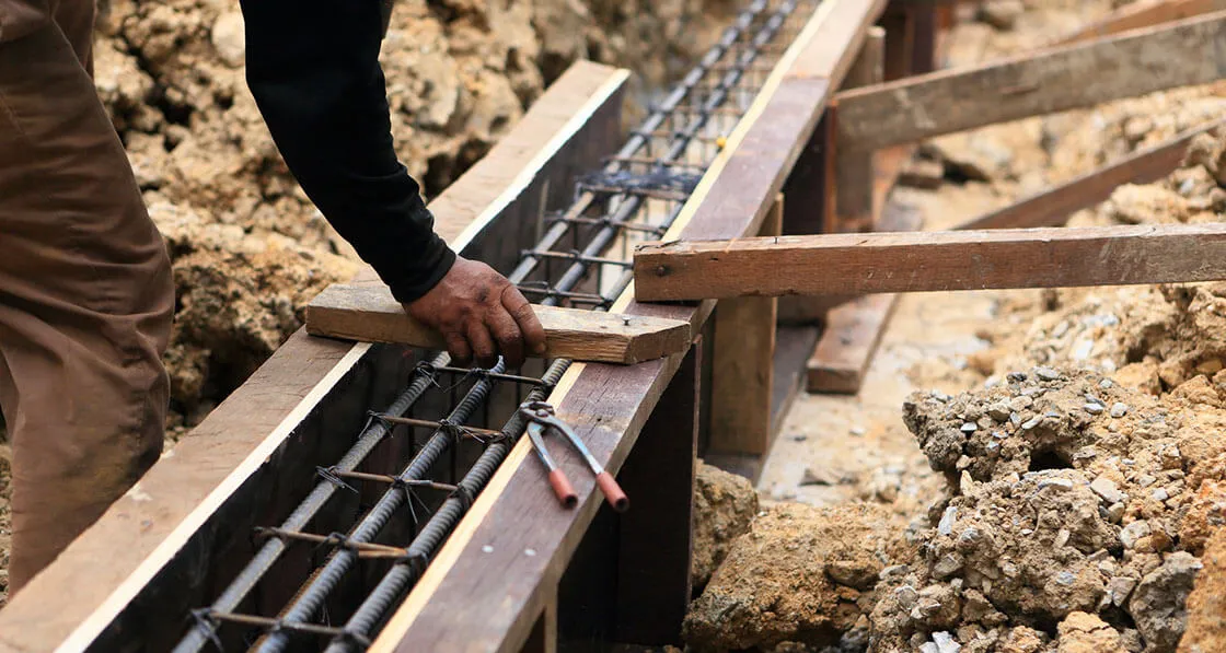 Jaki beton na fundamenty – uniknij błędów przy wyborze materiału Jaki beton na fundamenty – uniknij błędów przy wyborze materiału