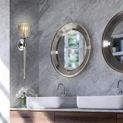 Jakie oświetlenie do okrągłego lustra, by uniknąć cieni i poprawić styl