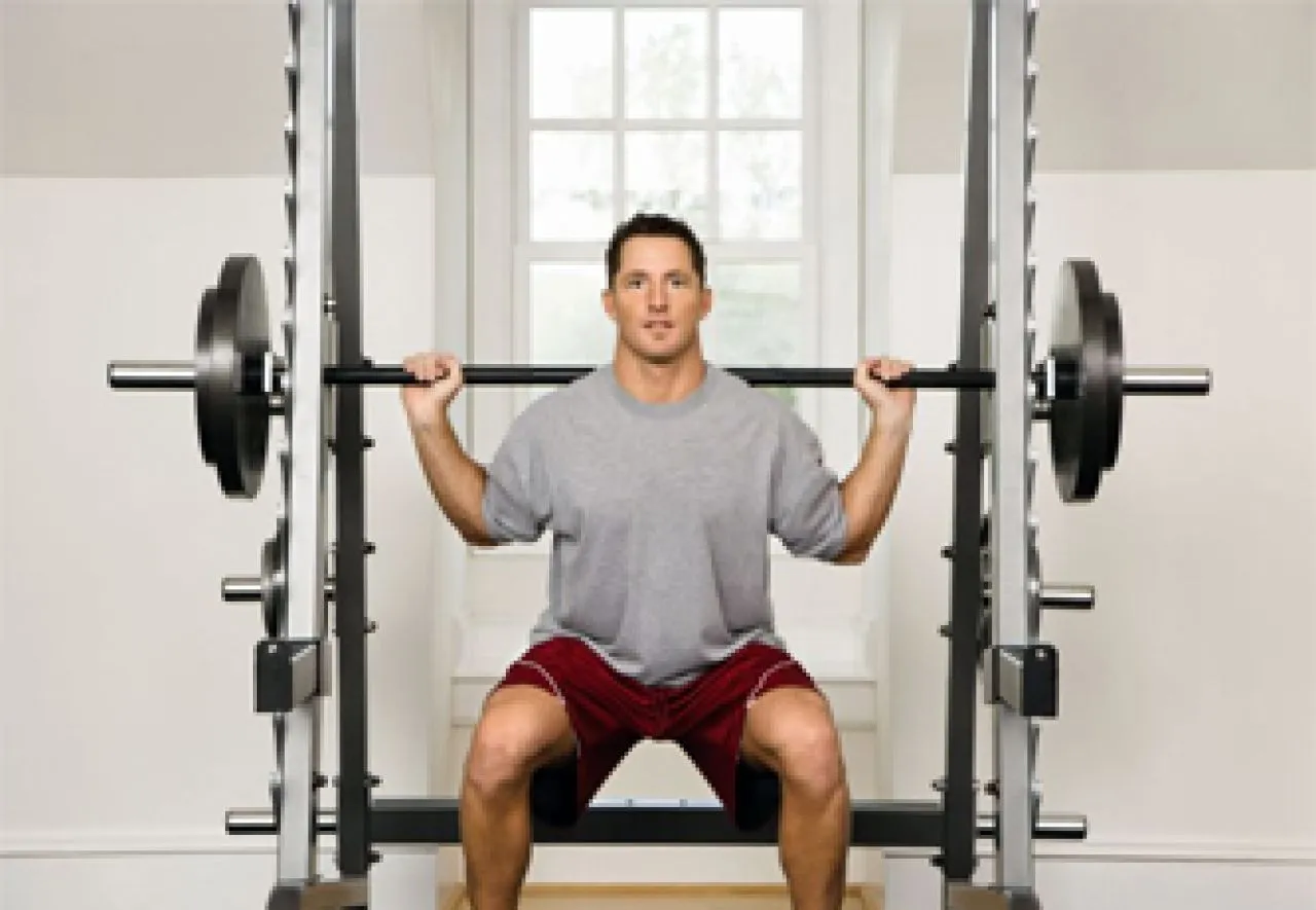 Przysiady z obciążeniem: Jak wykonać idealnie i unikać błędów?