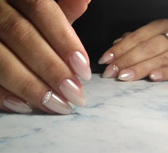 Perłowe paznokcie jak zrobić – proste kroki do zachwycającego efektu Perłowe paznokcie jak zrobić – proste kroki do zachwycającego efektu